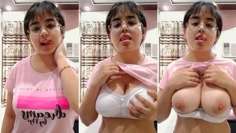 Beautiful sexy girl showing her big boobs